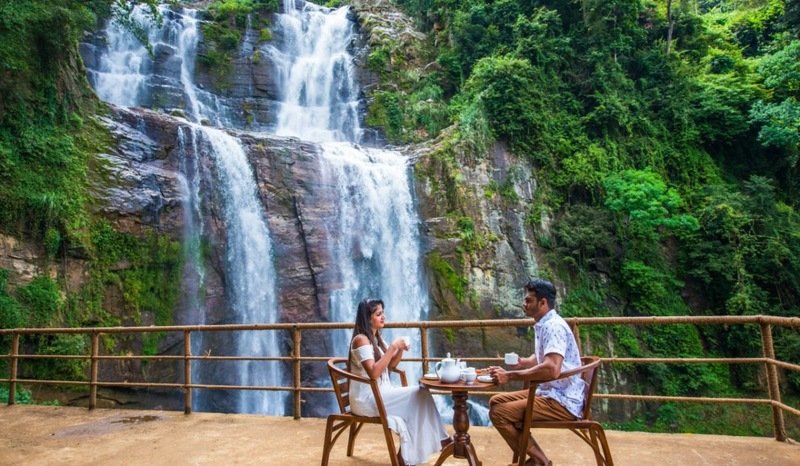 Couple Eating with View of Ramboda Falls