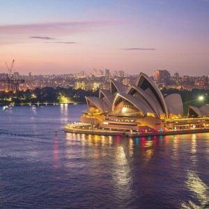 Sydney Opera House lit up in the evening