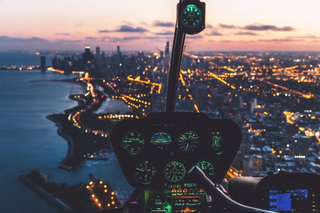 Helicopter cockpit and a sunset