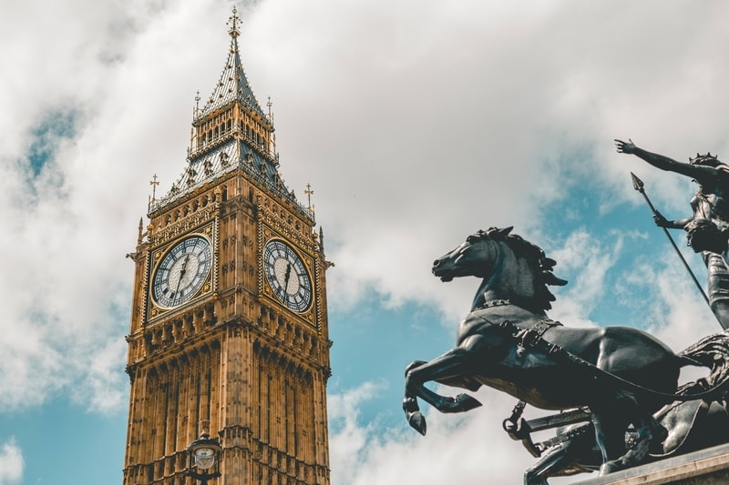 view of Big Ben and a statue that includes a horse