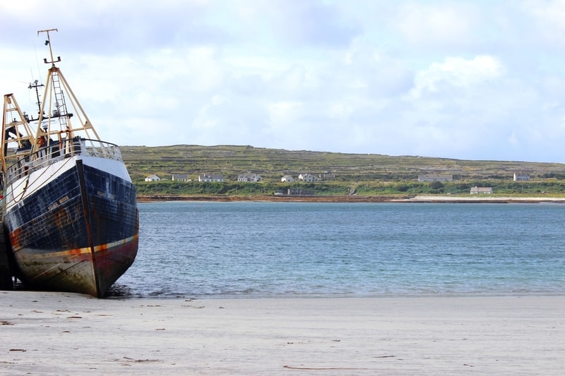 A boat on the shore of the Aran Islands