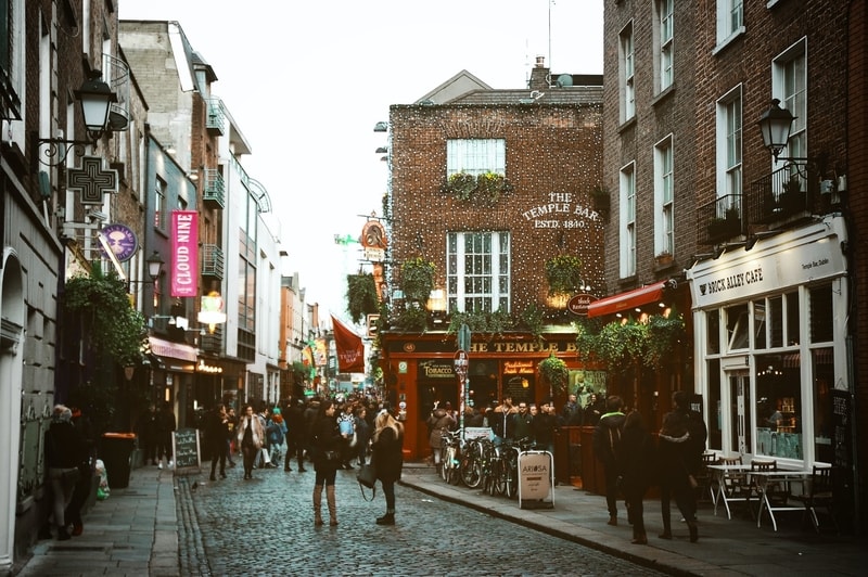 A Dublin street with the famous Temple Bar in the background