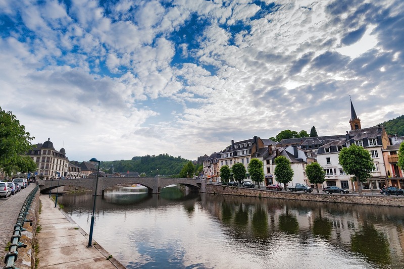 A river in Bouillon, Belgium with houses on the banks