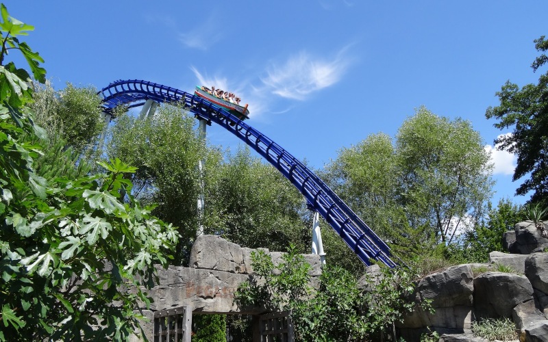 People on a blue roller coaster in Germany's Europa-Park 