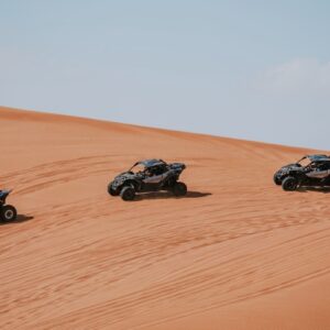 Three ATVs in the desert