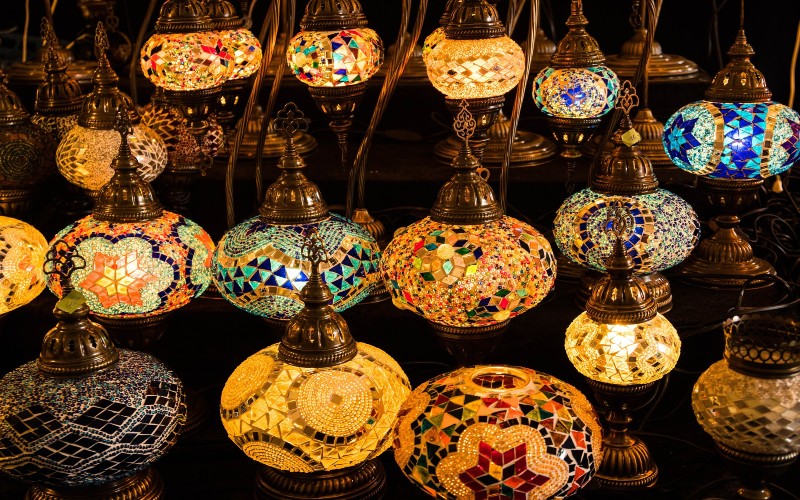 traditional turkish lanterns lit in dim lighting they all have different patterns