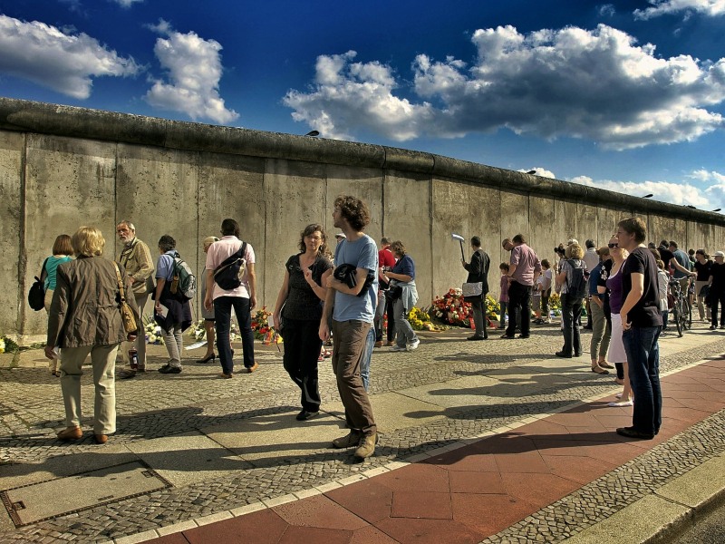 A group of people at the Berlin Wall Memorial