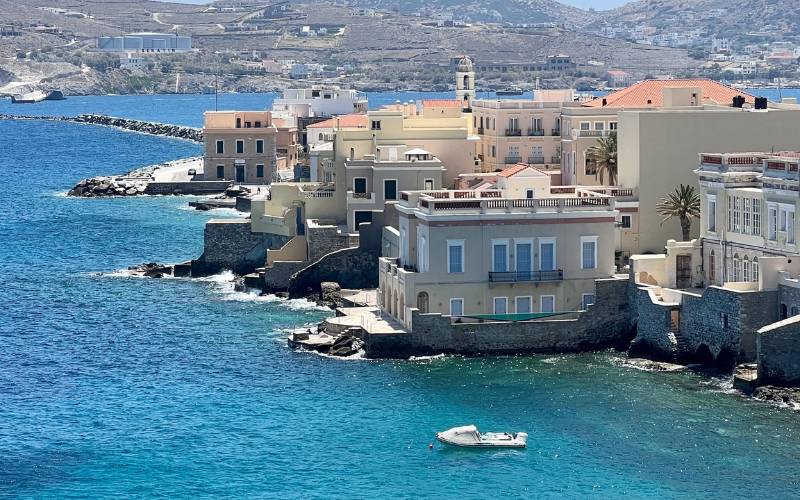 Buildings along the seaside in Syros, Greece.