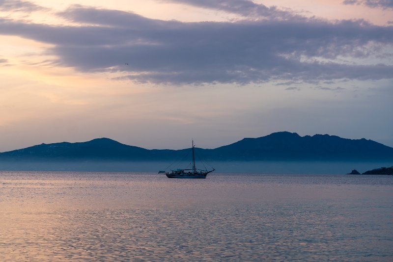 boat sailing at mykonos greece