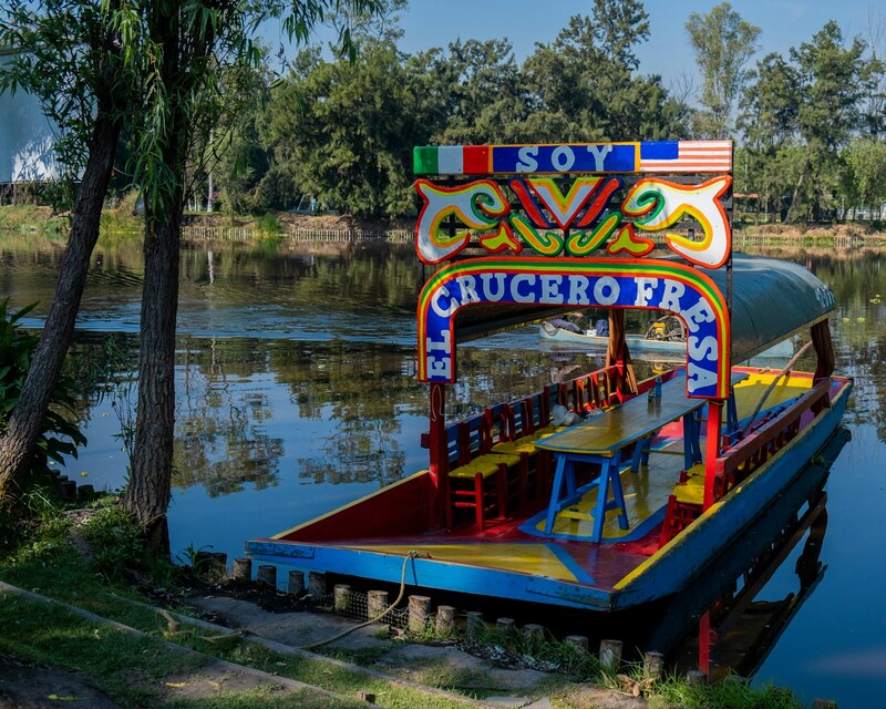 Colorful boat on a river bank